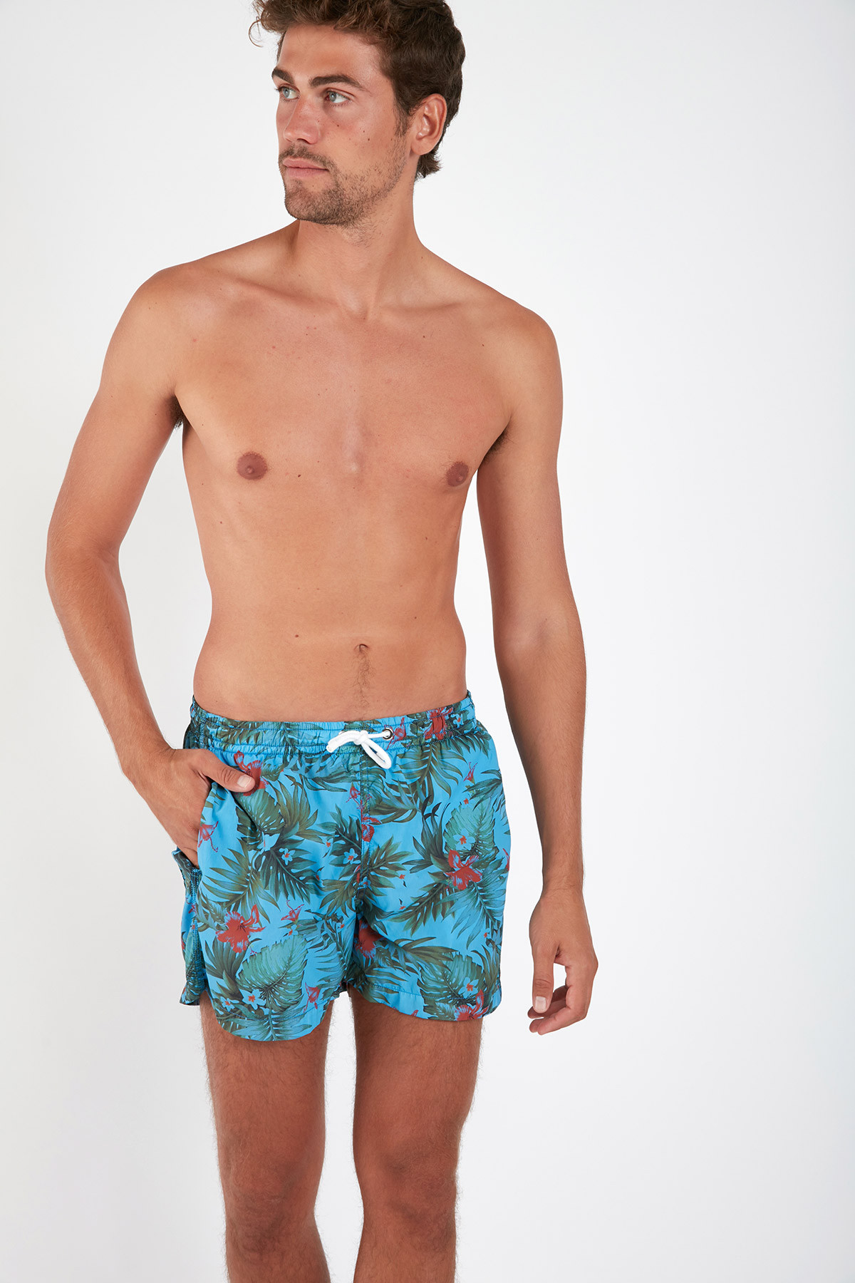 men wearing tied board shorts in turquoise.  Men's swimsuits, Mens  swimwear, Beachwear collection