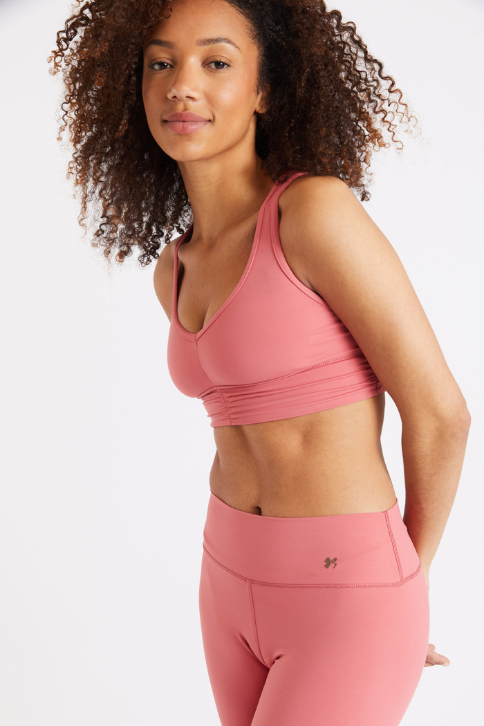 Flow Wellness pink sports bra